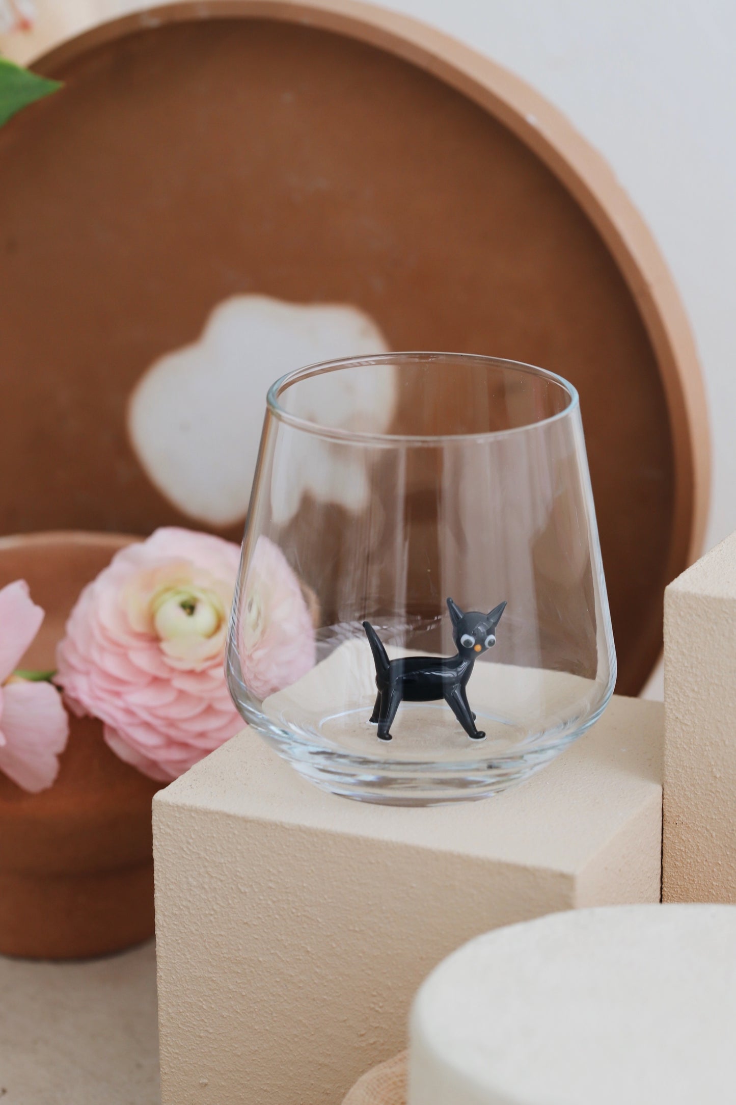 cat drinking glass detail